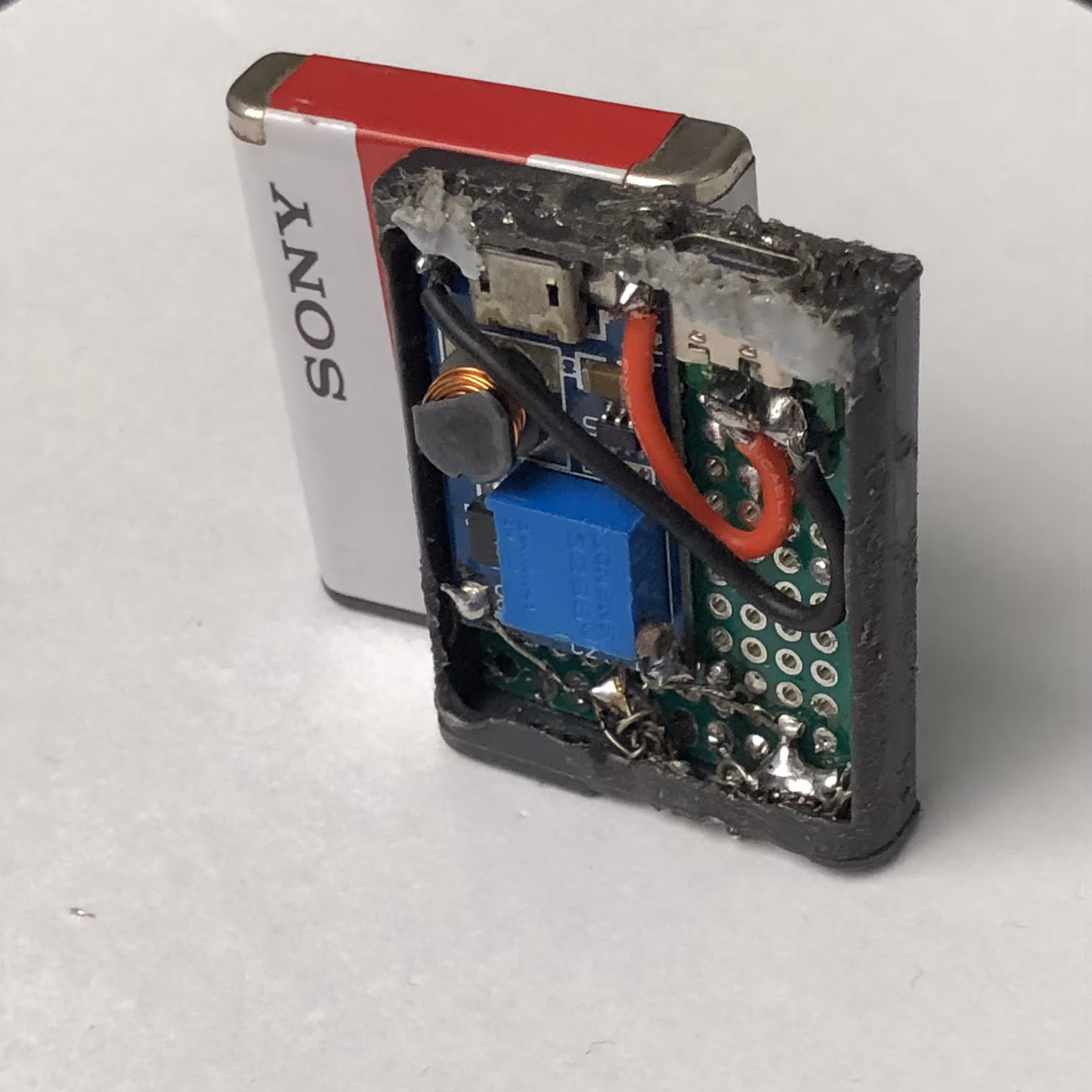 completed dummy battery next to official sony