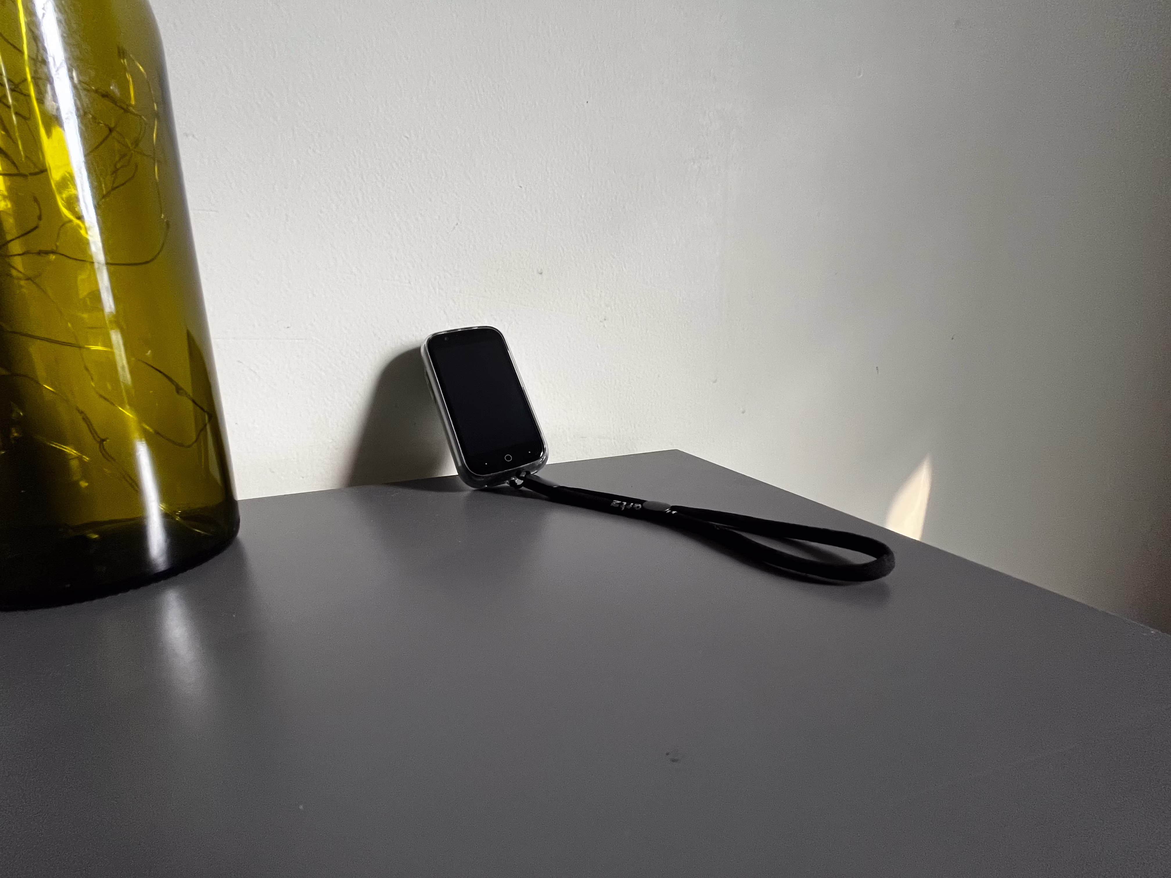 jelly star phone leaning against wall